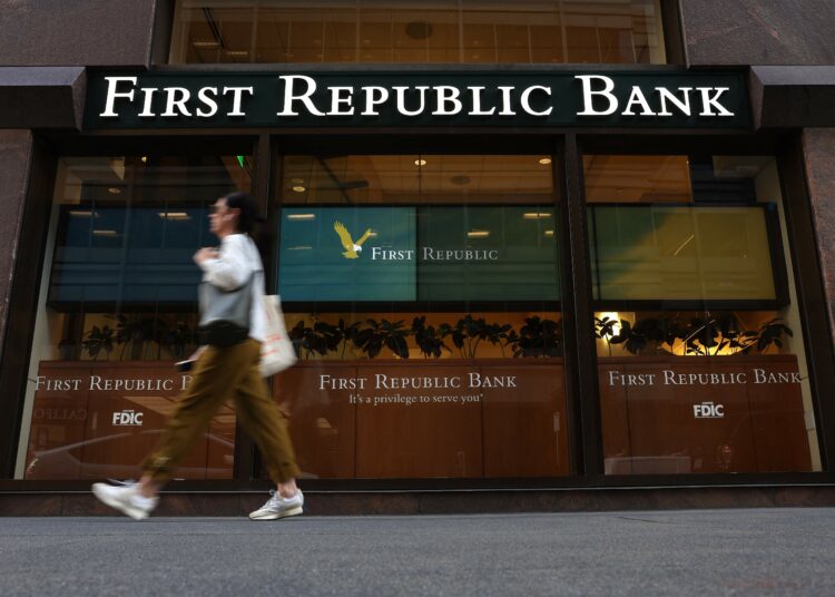 SAN FRANCISCO, CALIFORNIA - APRIL 26: A pedestrian walks by a First Republic bank on April 26, 2023 in San Francisco, California. Shares of San Francisco-based bank First Republic continue to fall as the New York Stock Exchange halted trading of the stock at least a dozen times on Wednesday following the company's earnings report that showed its clients had withdrew more than 40% of deposits in the first quarter following the collapse of Silicon Valley Bank.   Justin Sullivan/Getty Images/AFP (Photo by JUSTIN SULLIVAN / GETTY IMAGES NORTH AMERICA / Getty Images via AFP)