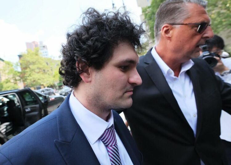 NEW YORK, NEW YORK - AUGUST 11: Former FTX CEO Sam Bankman-Fried arrives for a bail hearing at Manhattan Federal Court on August 11, 2023 in New York City. Federal prosecutors are asking U.S. District Court Judge Lewis Kaplan to revoke Bankman-Fried's bail and to be jailed until his October criminal trial. Bankman-Fried who has pleaded not guilty to multiple conspiracy and fraud charges was accused of witness tampering after the New York Times published a story featuring personal documents of Caroline Ellison, former Alameda Research CEO. Judge Kaplan will also hear arguments on the gag order placed on Bankman-Fried that was placed as part of his bail agreement for the alleged witness tampering.   Michael M. Santiago/Getty Images/AFP (Photo by Michael M. Santiago / GETTY IMAGES NORTH AMERICA / Getty Images via AFP)